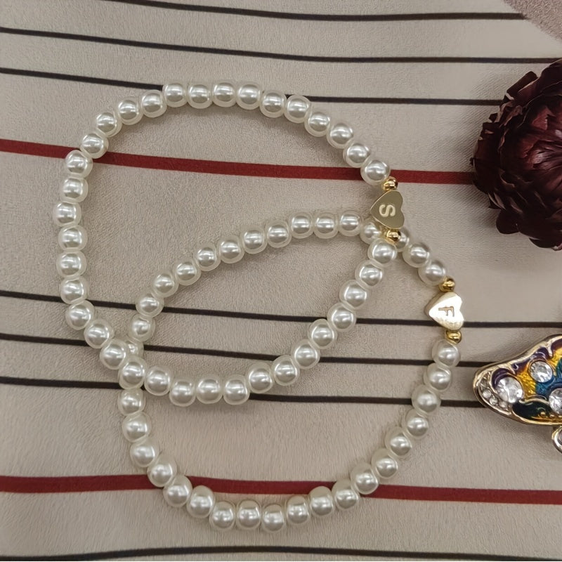 תכשיט צ'יק עם אות בלב (A–Z)